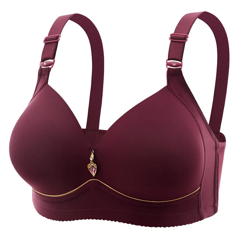 Élégant soutien-gorge de maternité bordeaux avec pendentif décoratif et détails dorés.
Nom du produit: Soutien Elégant avec Bonnet fin
Nom de marque: BÉBÉ PREMA