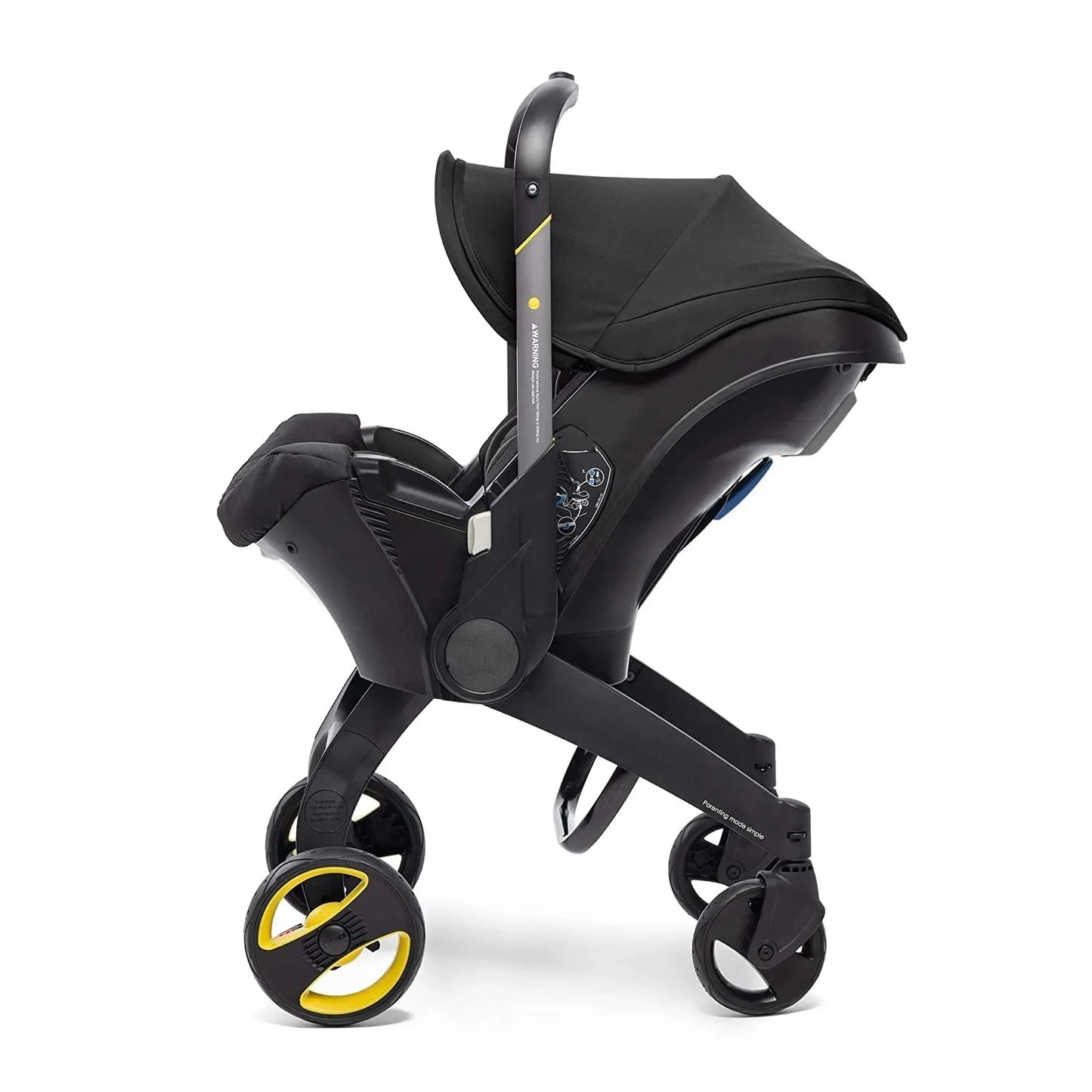 Une poussette noire élégante et moderne avec un design lisse et ergonomique. Il dispose d'un cadre compact, de quatre roues (deux à l'arrière et deux à l'avant) et d'un guidon pour des manœuvres faciles. La Poussette 4 en 1 Cosy Bébé de BABY-PREMA est dotée d'un auvent pour l'ombre et d'un siège conçu pour un jeune enfant ou un nourrisson.
