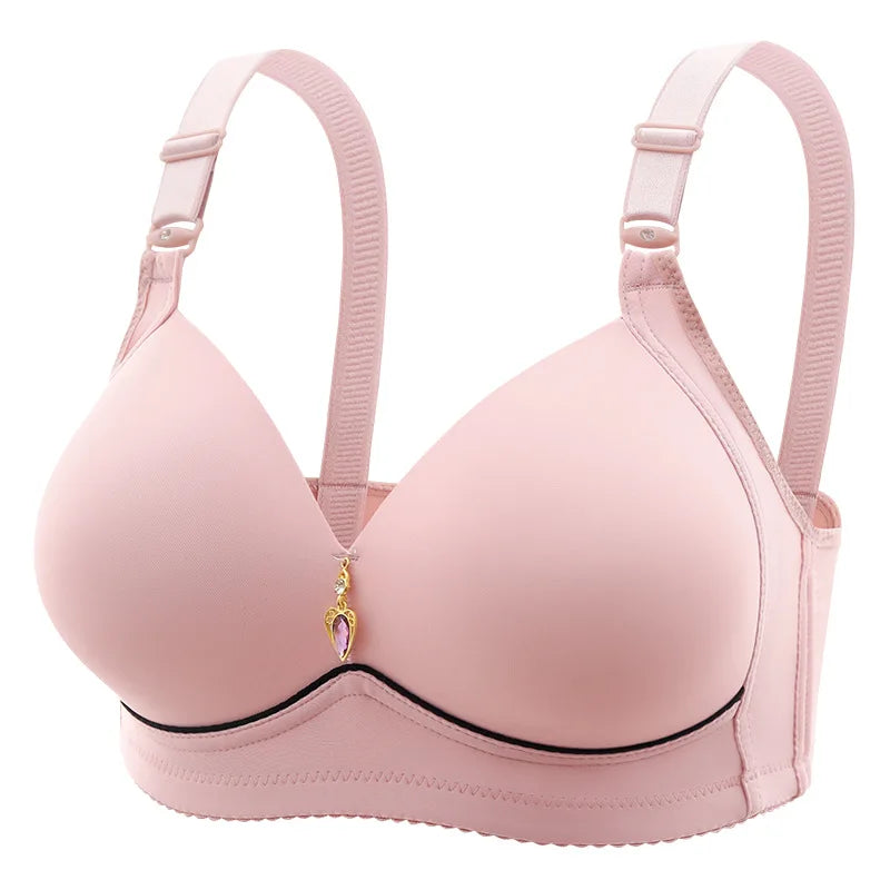 Un soutien-gorge de maternité rose Soutien Elégant avec Bonnet fin avec bretelles réglables et un petit pendentif décoratif au centre de BABY PREMA.