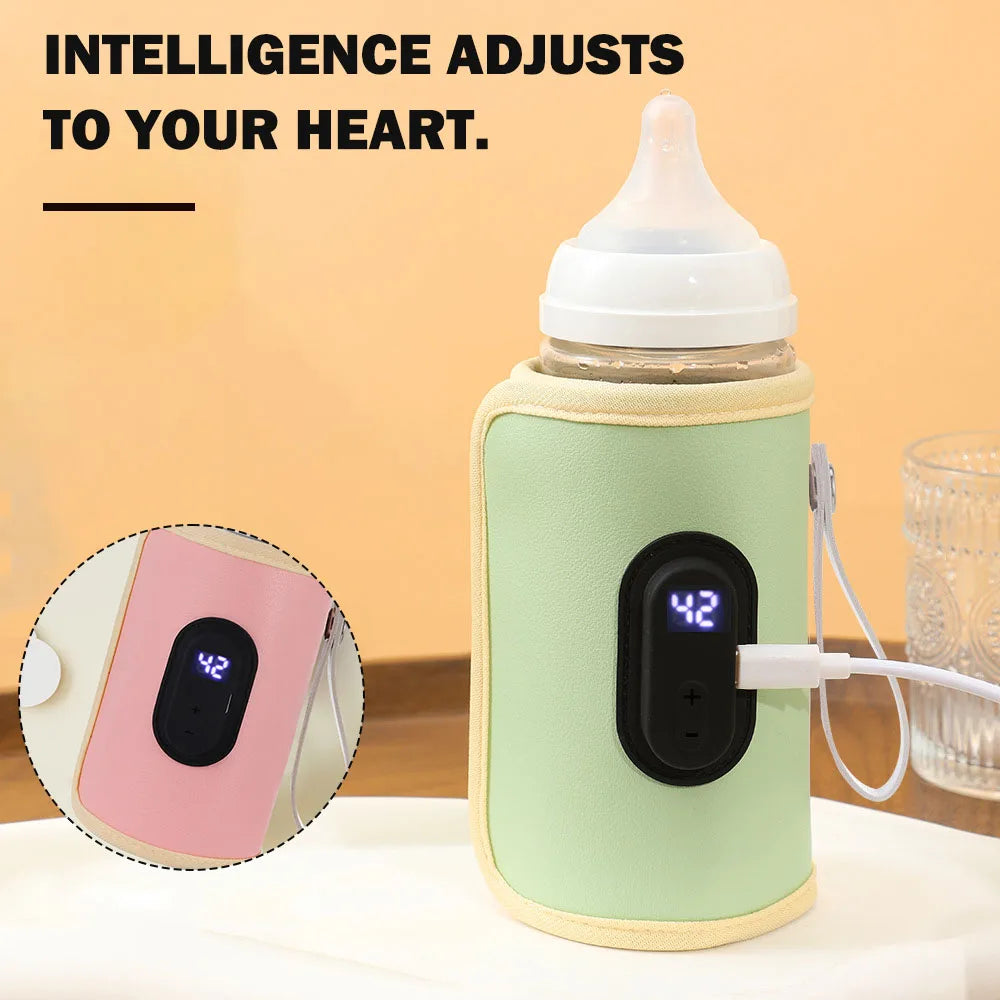 Un biberon est enveloppé dans un chauffe-biberon électronique vert et jaune, BABY-PREMA Chauffe-Biberon Portable multifonction, affichant une température numérique de 42 degrés. Connecté à un câble USB blanc, le texte au-dessus de la bouteille indique : "L'INTELLIGENCE S'AJUSTE À VOTRE COEUR". Un encart montre une version rose du chauffe-biberon pour bébé.