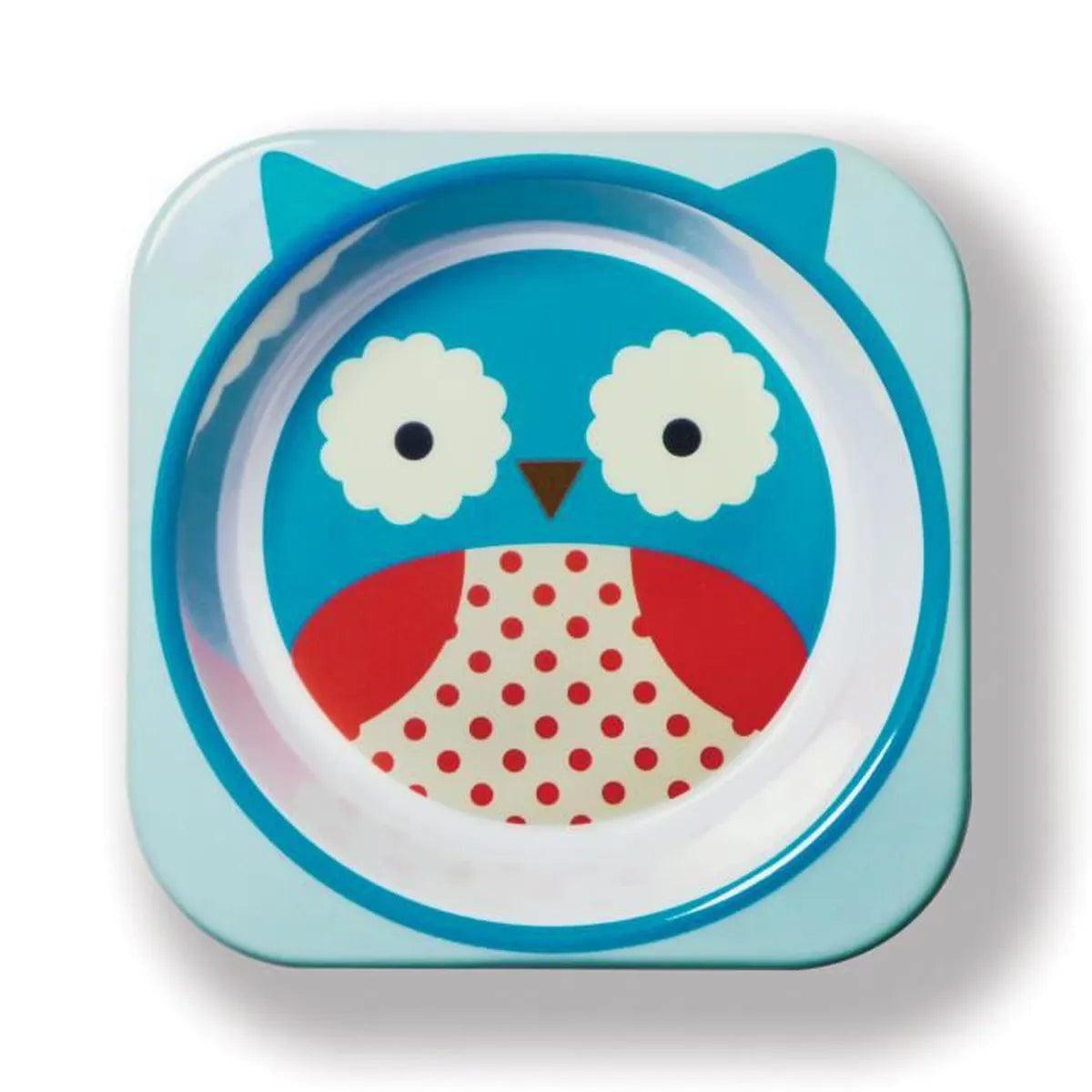 Une assiette pour enfant colorée de forme carrée aux coins arrondis et d'une chouette bleue illustrée avec des détails blancs et rouges sur fond bleu clair, parfaite pour les repas bébé.
Nom du produit : Assiette (Bol) Skip Hip
Nom de la marque : SAUTER HOP