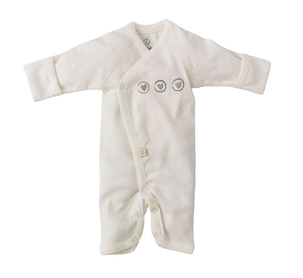 Combinaison bébé Dors Bien Pieds Préma - Early Birds couleur crème avec détails de têtes d'animaux et boutons pression sur fond blanc, un article indispensable bébé de BABY PREMA.