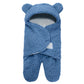 Sac porte-bébé bleu douillet avec capuche en forme d'oreilles d'ours et style enveloppant, un accessoire parfait pour bébé.
Nom du produit: Couverture Bébé Doux Confortable | Pour Tenir Chaud de BABY-PREMA.
