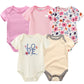 Cinq *Pack de 5 Bodies Bébé Coton Doux* sont présentés : un rose uni, un rayé rose et blanc, un fleuri, un blanc avec texte "LOVE" et un beige avec bordure grise. Disponible en tailles de 0 à 24 mois. (*Nom de marque : BÉBÉ PREMA*).