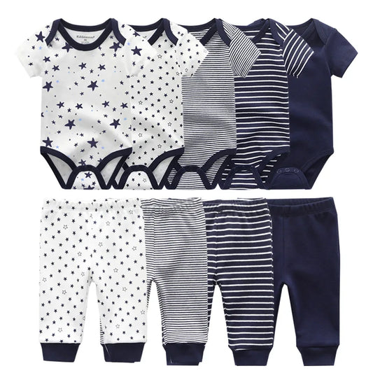 Un ensemble de six grenouillères pour bébé et six pantalons, confectionnés à partir de bodys en coton, présentant des motifs bleus, blancs, étoiles et rayures répartis sur deux rangées. Le Pack Pantalons & Bodies Bébé de BABY PREMA propose des ensembles nouveau-nés parfaits pour la garde-robe de votre tout-petit.