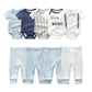 Voici une collection de vêtements pour bébé intitulée "Kit Ensemble Body Pantalons Bébé" de la marque BABY PREMA, comprenant huit tenues uniques. La gamme du haut présente six combinaisons en coton doux et respirant avec divers motifs et couleurs, y compris des rayures et des carreaux. La rangée du bas met en avant cinq pantalons dans des tons de bleu et blanc, certains à rayures ou à pois.