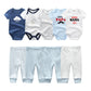 Une collection de vêtements pour bébé est présentée, comprenant le **BABY PREMA Kit Ensemble Body Pantalons Bébé**, qui comprend quatre combinaisons à manches courtes avec des imprimés ludiques, notamment des nuages et du texte. Fabriqué en coton doux et respirant, l'ensemble comprend également quatre pantalons dans des tons de bleu et de blanc avec des rayures, des pois et des couleurs unies.