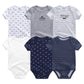 Une collection de six combinaisons à manches courtes pour bébé dans différents motifs et couleurs, dont le blanc, le gris et le bleu marine, avec des textes et des motifs tels que des rayures, des voitures, des lunettes et des slogans. Chaque Lot Body Bébé 6 Pièces en Coton de BABY PREMA présente un col rond confortable garantissant que votre tout-petit reste au chaud toute la journée.