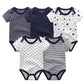 Cinq combinaisons bébé en coton doux avec des motifs variés dont des rayures, des étoiles et des couleurs unies dans un thème marine et blanc affichés à plat - Pack de 5 Bodies | Coton Doux Bébé de BABY PREMA est une garde-robe de bébé essentielle et un cadeau attentionné pour les nouveaux parents.