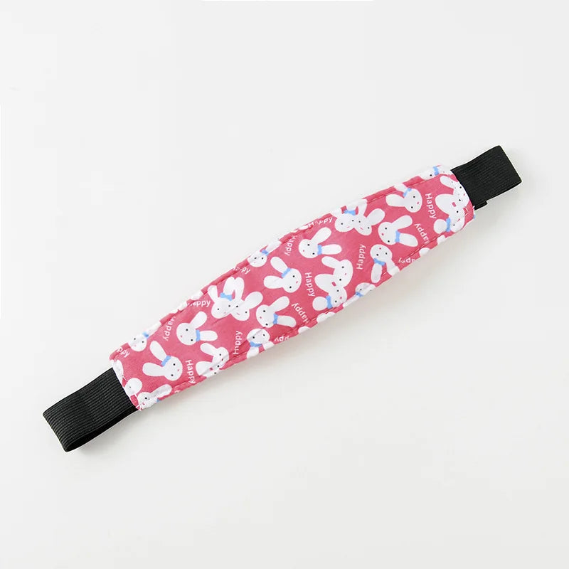 Une Ceinture de Fixation réglable pour Bébé rose ornée d'un joli motif de lapin blanc sur fond uni, parfaite pour le nécessaire pour bébé de BABY PREMA.