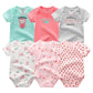 Six combinaisons pour bébé de différentes couleurs et motifs, notamment des rayures, des hiboux, des fleurs et des textes, sont disposées en deux rangées de trois. Ces adorables Lot de 6 Pièces Body Coton Bébé de BABY PREMA sont disponibles en vert, rose et gris. Parfait pour les vêtements bébé!