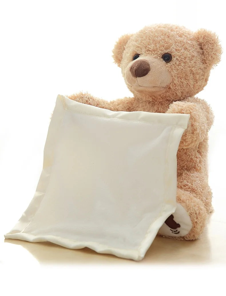 Une peluche Doudou Ours douce et câline de BABY-PREMA tenant une pancarte ou un oreiller blanc et vierge, prête pour un message ou une personnalisation pour un bébé ou un enfant prématuré, sur un fond propre et léger.