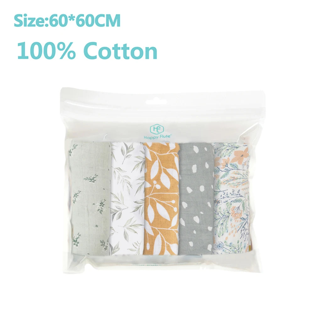 Lot de quatre langes BABY PREMA en mousseline 100% coton pour bébé, aux motifs assortis, taille 60x60cm, présentés dans un emballage transparent.