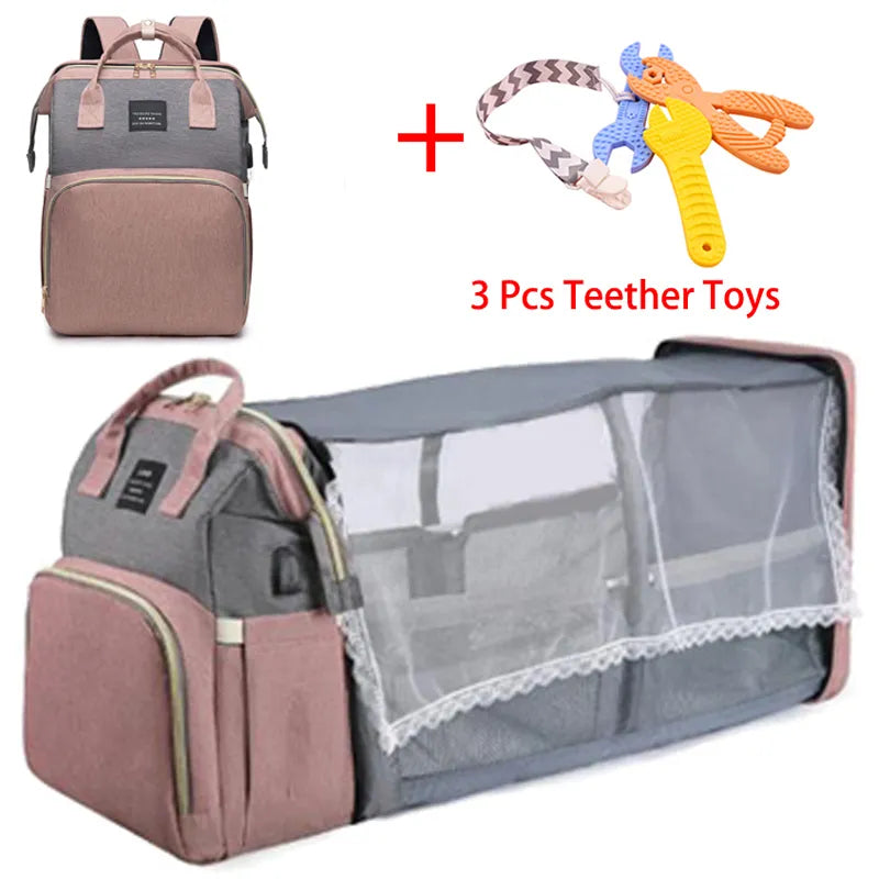 Un sac à dos à couches pour bébé BABY PREMA polyvalent avec un berceau portable combiné à un ensemble de trois jouets de dentition colorés pour nourrissons, parfait pour votre petit enfant.