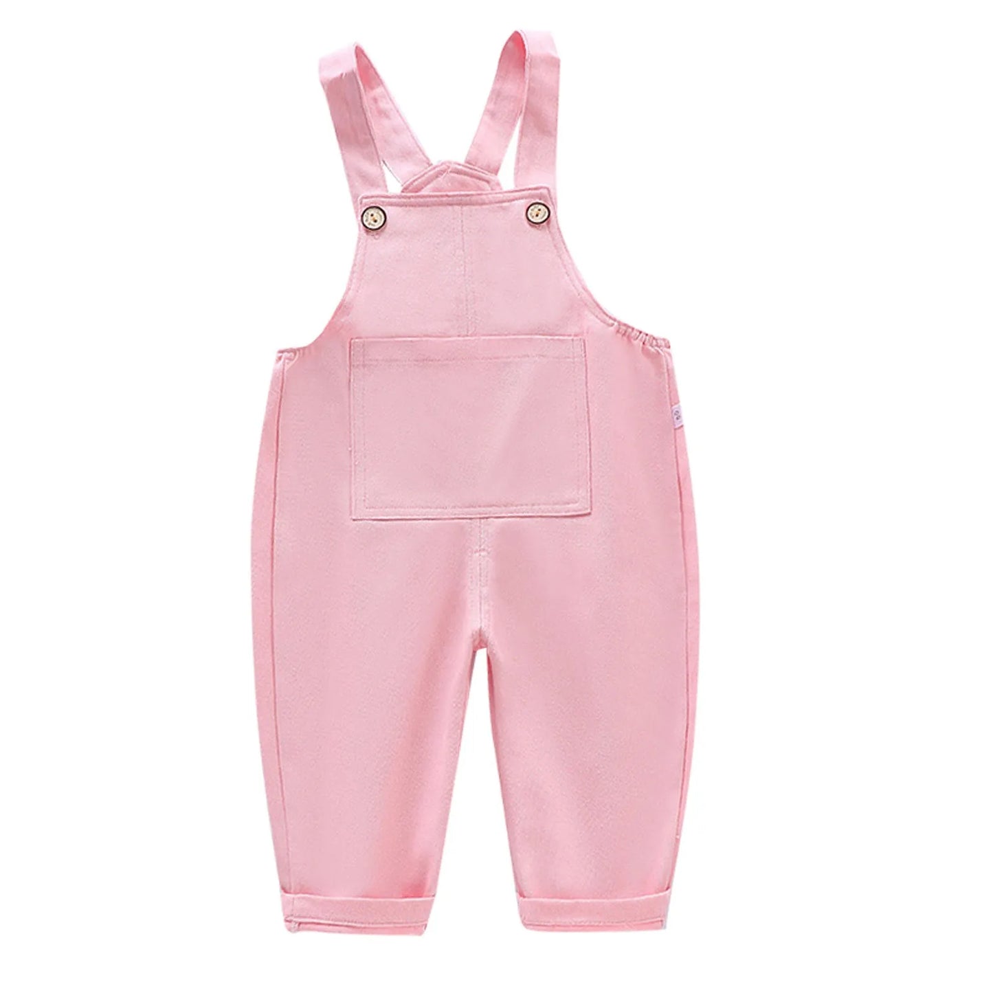 Salopette bébé rose avec bretelles, poche avant et boutons latéraux, confectionnée en coton ou en denim. Ces adorables Salopette Bébé Unie de BABY-PREMA sont présentées sur un fond blanc.