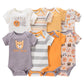 Un **Lot de 4 Bodies Bébé Couleurs été** dans différentes couleurs et motifs, notamment des rayures, des animaux et des textes comme « LITTLE ONE » et « BABY BEAR ». Ces bodys bébé BABY PREMA sont disponibles dans des tons de blanc, orange, jaune et lavande : des vêtements d'été parfaits pour votre tout-petit.