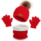 Un ensemble d'accessoires d'hiver rouge vif composé d'un BABY PREMA Ensemble 3Pièces Bonnet Gants pour Bébé avec un pompon en fausse fourrure, un cache-cou assorti avec une doublure en peluche et une paire de gants rouges confortables pour bébé.
