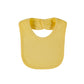 Un Bavoir Bébé en Coton Bio jaune uni avec un bouton-pression, isolé sur un fond blanc de la marque BABY PREMA.