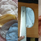 Un collage présentant une variété de couvre-couches Extenseur de Body Bébé 100 % coton colorés ainsi qu'une règle de mesure pour référence de taille, parfait pour le temps dodo de bébé. (BÉBÉ-PREMA)