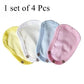 Un lot de quatre serviettes menstruelles Extenseur de Body Bébé 100 % coton avec boutons-pression, présentées en éventail, adaptées au bébé de BABY-PREMA.