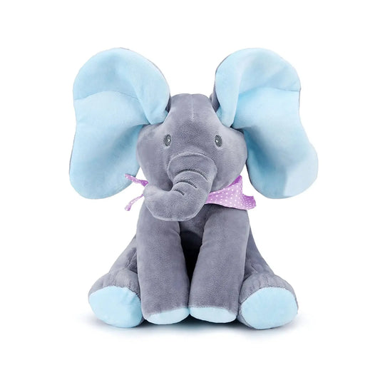 Un jouet doux et moelleux BABY-PREMA Doudou Eléphant Peluche Musicale avec des oreilles bleu ciel et des pieds assortis, orné d'un joli nœud à pois violets, repose sur un fond blanc, prêt pour les câlins d'un bébé.